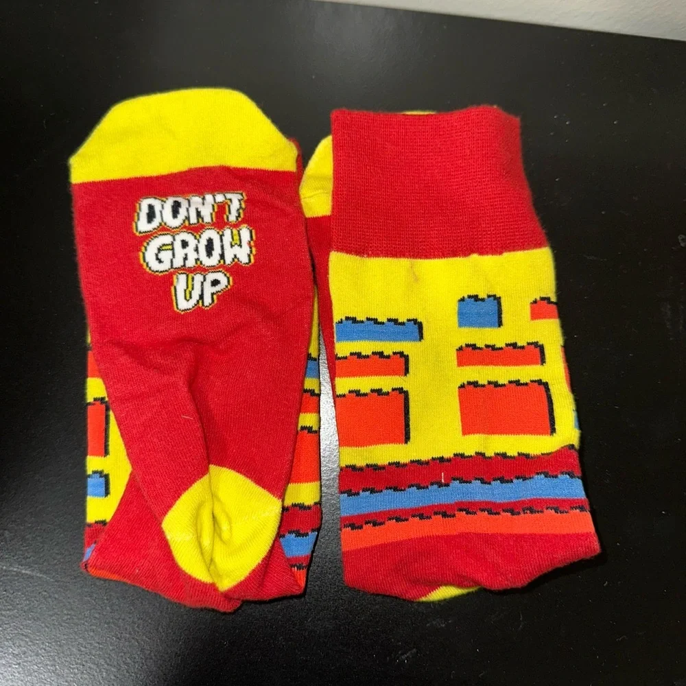 Unisex Red and Yellow Don't Grow Up, It's a Trap Socks Crew Socks One Size - Picture 2 of 7